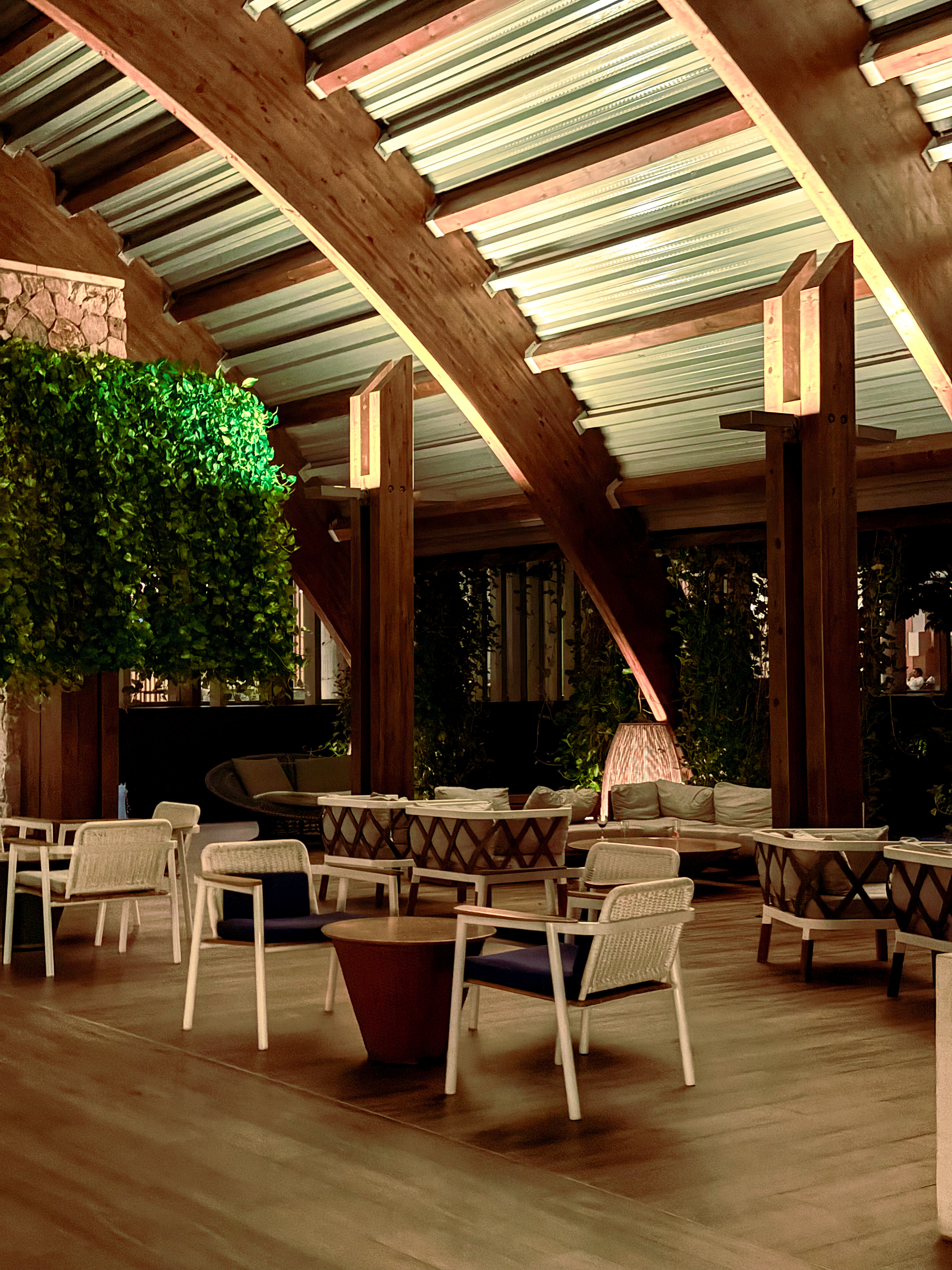 Boutique hotel lounge interior atmosphere with natural materials