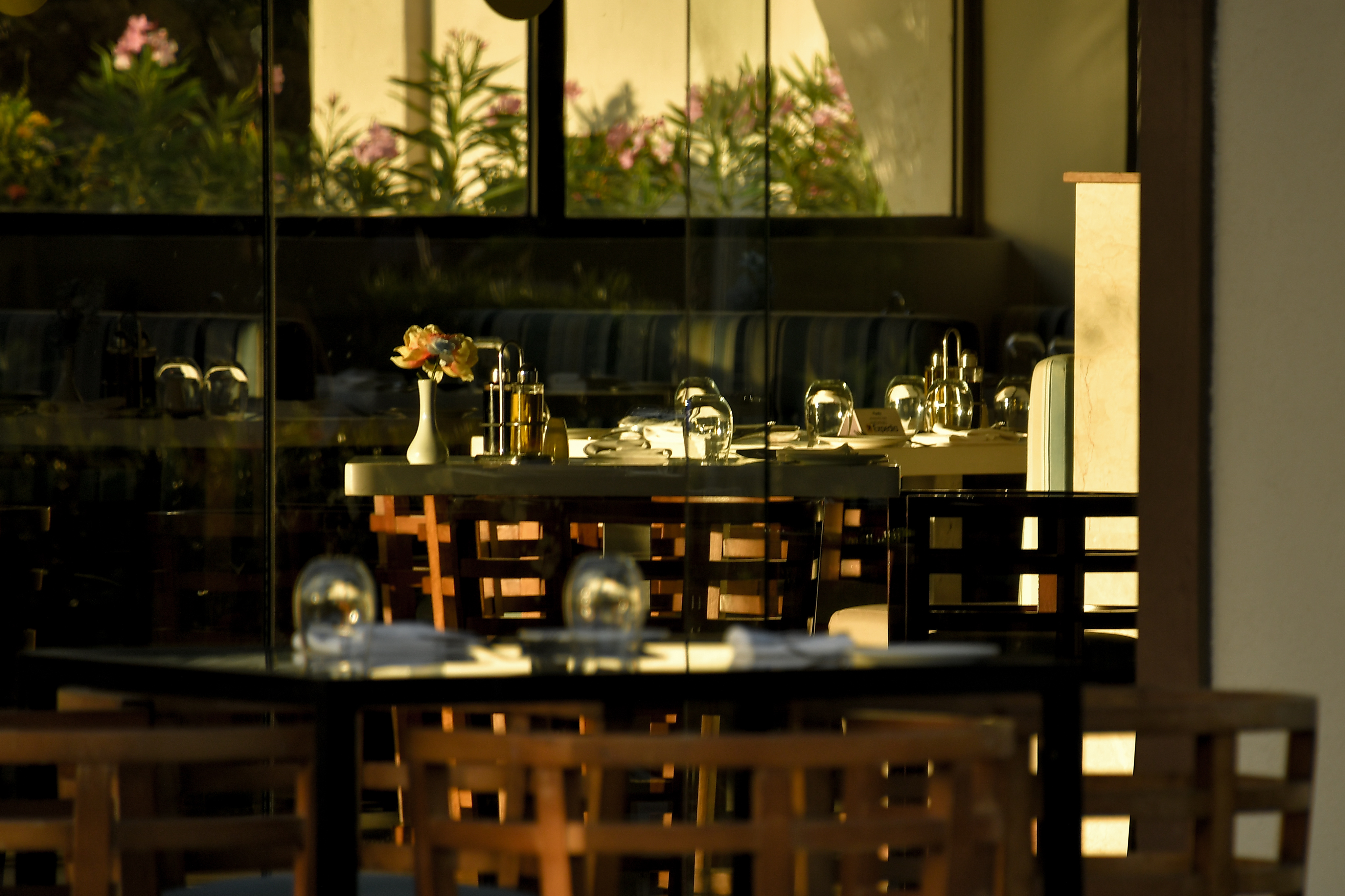 Editorial restaurant atmosphere with warm evening light